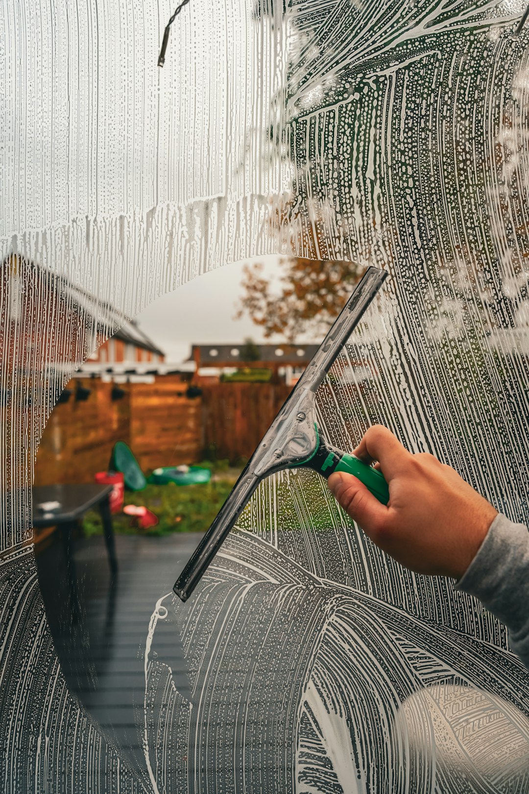 a-person-is-drawing-a-picture-on-a-window-jr9wxkcwjt0